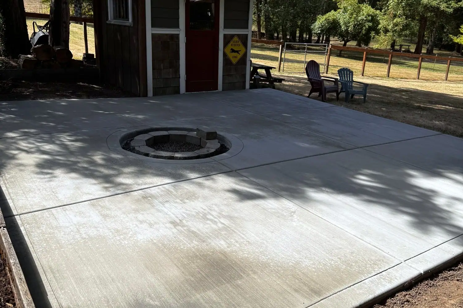 Backyard patio with a fire pit