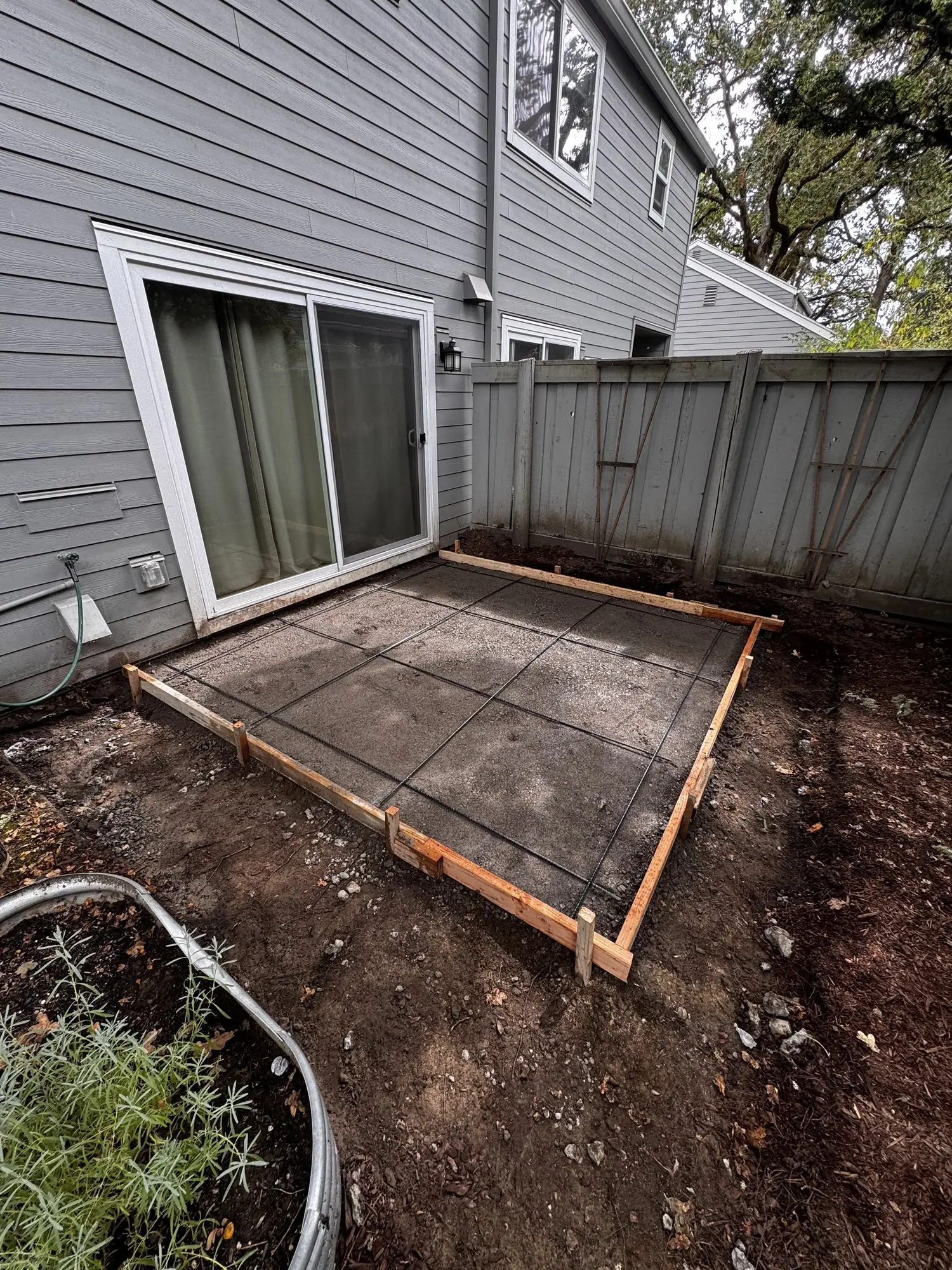 Forms and rebar set on a compacted gravel base